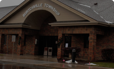 image of burtchville township hall with some snow scattered around the hall